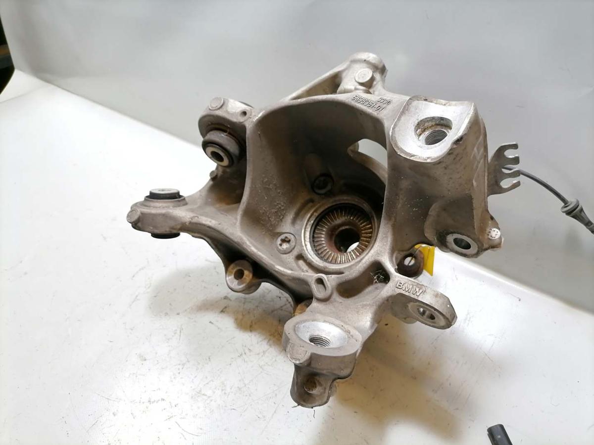 BMW 7er G70 original Achsschenkel Radlagergeh&auml;use hinten links 4,4 400KW Bj.2022